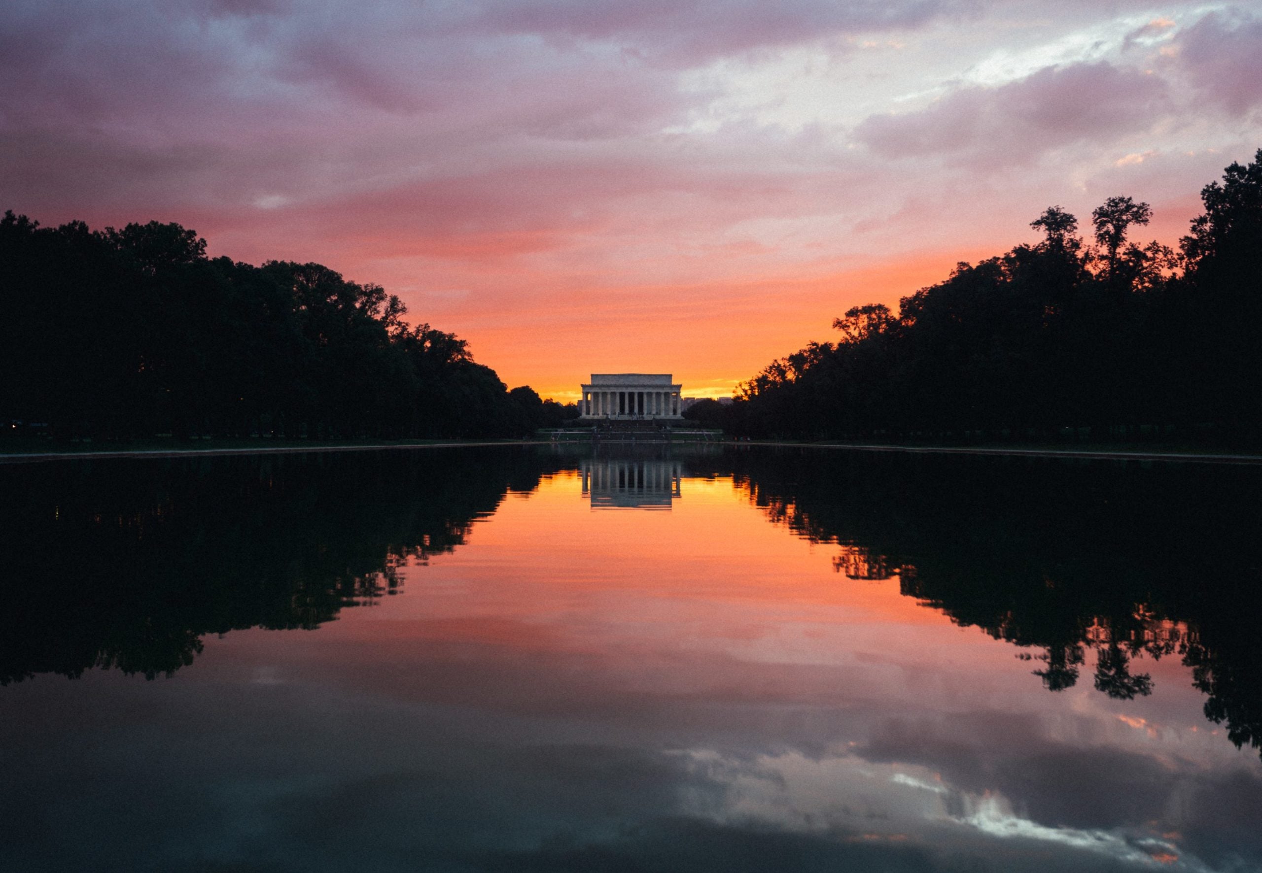 Lincoln Memorial at sunrise with the Reflecting Pool in the foreground